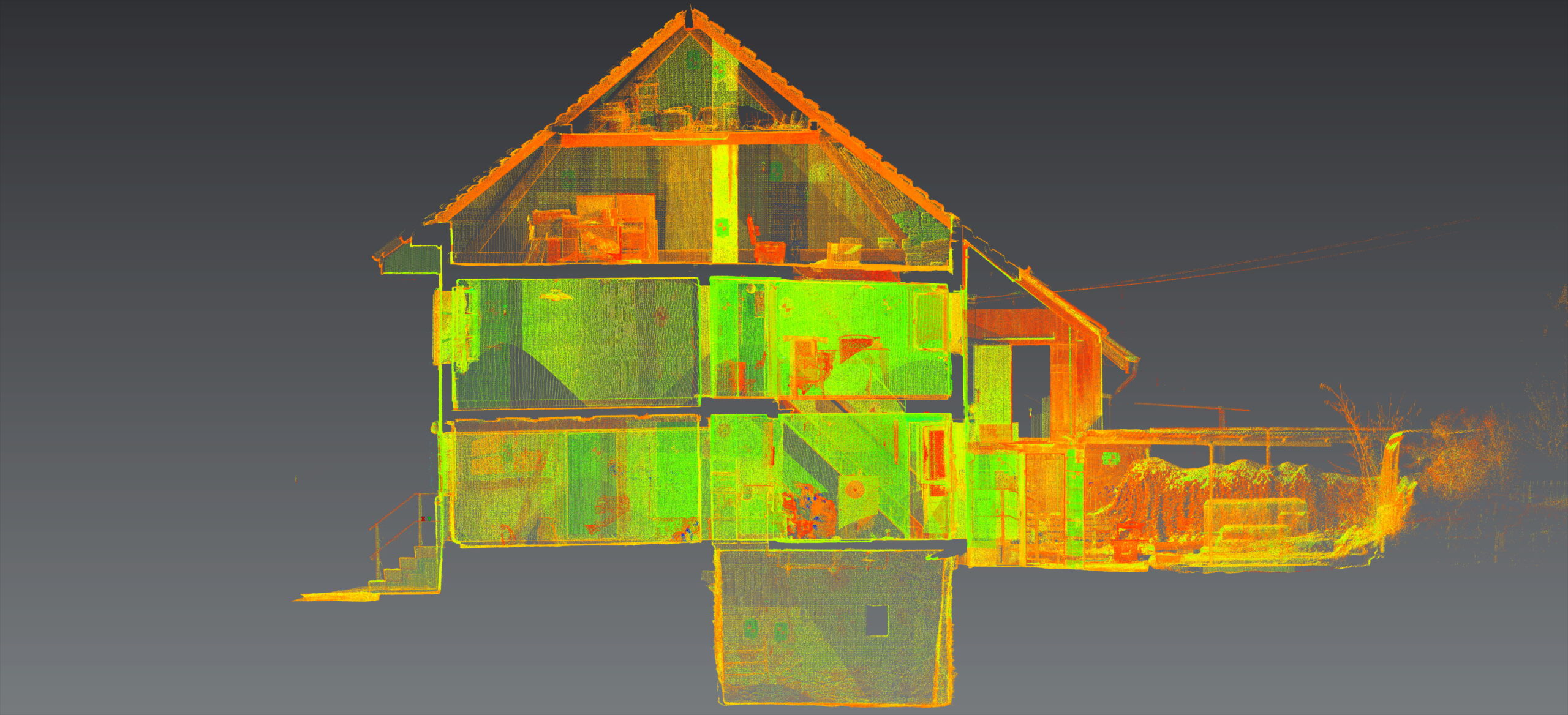 3D-Laserscan eines alten Gebäudes, der die verschiedenen Ebenen in leuchtenden Farben darstellt.